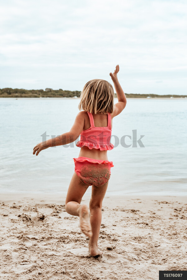 Girl Dancing on Beach