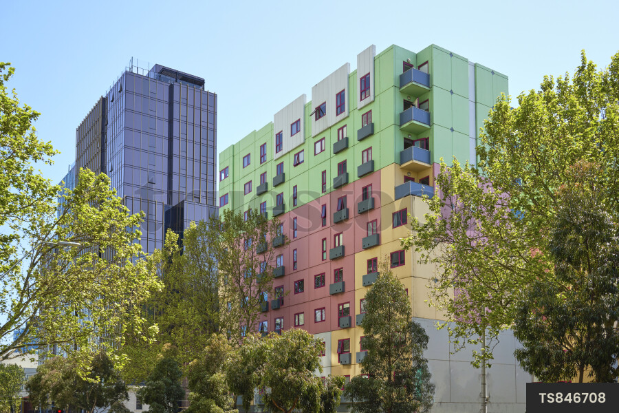 Building under construction next to apartment